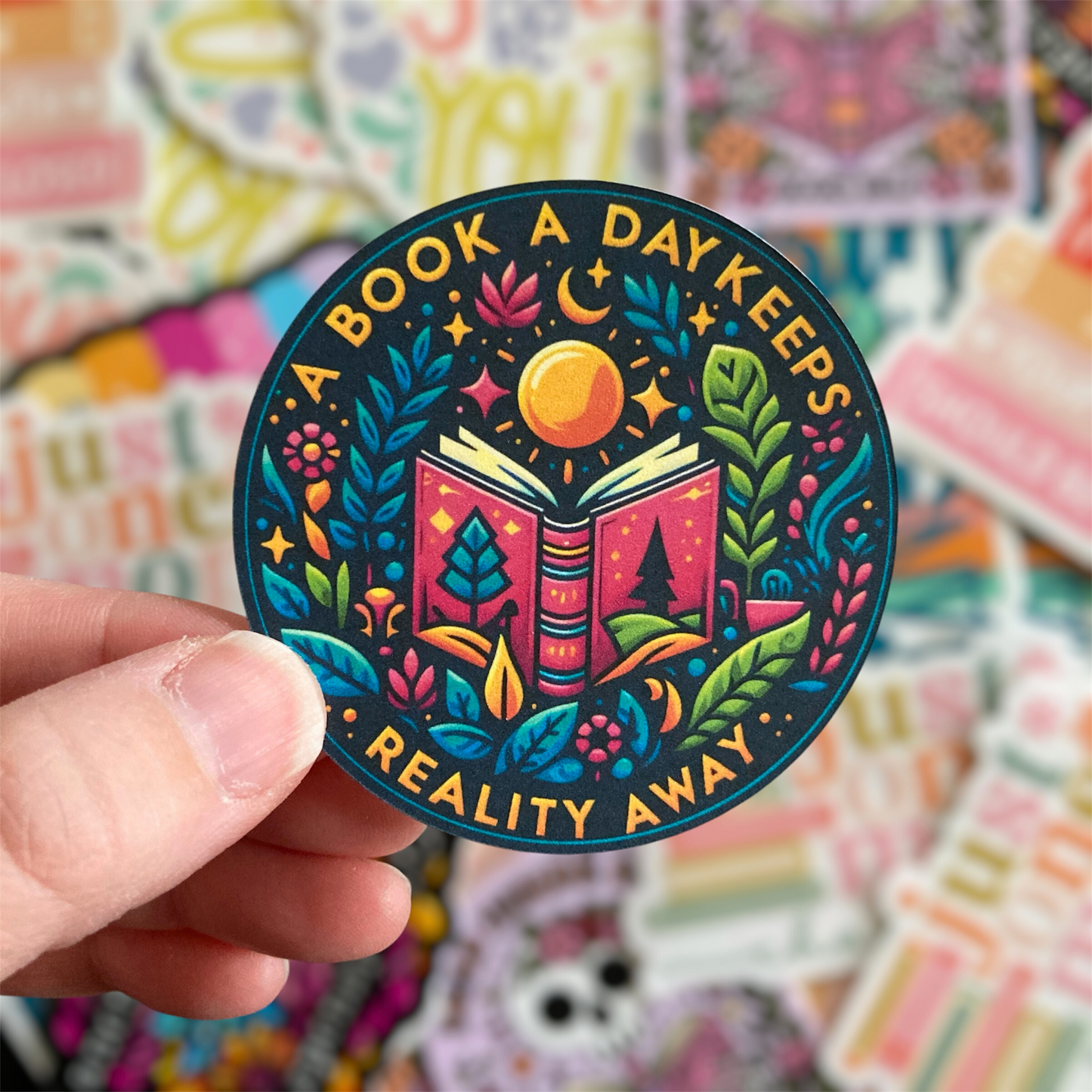 A Book A Day Keeps Reality Away Round Sticker